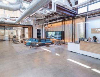 a room filled with furniture and a large building