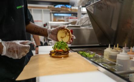 a person cutting food on a table