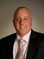 a man wearing a suit and tie