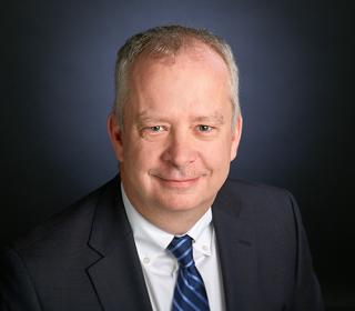 a man wearing a suit and tie