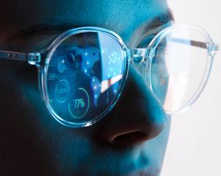 a close up of a person wearing sunglasses