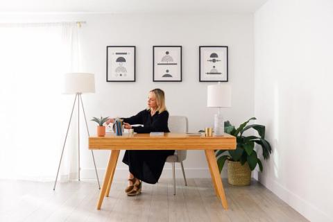 a person sitting at a table in a room