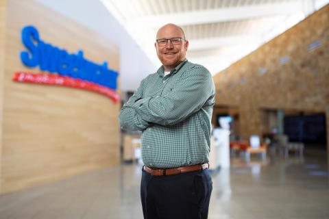 a person standing in front of a building