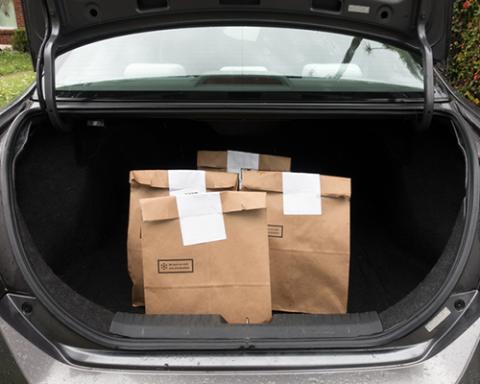 a piece of luggage sitting on top of a car