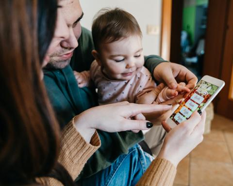a person holding a baby