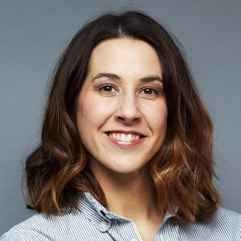 a woman smiling for the camera