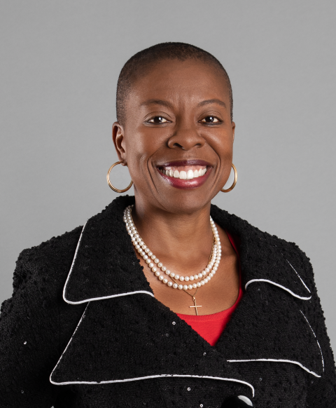 a woman smiling for the camera