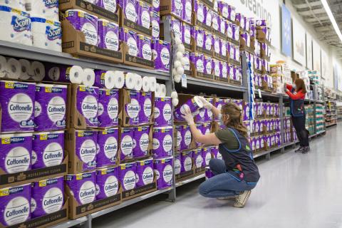 a person standing in front of a store