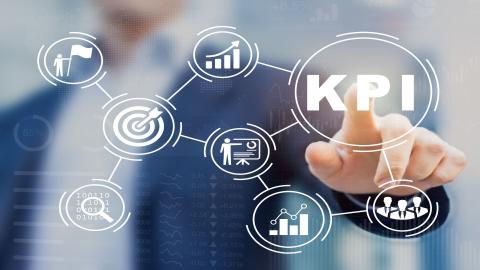 Man selecting KPIs on a screen