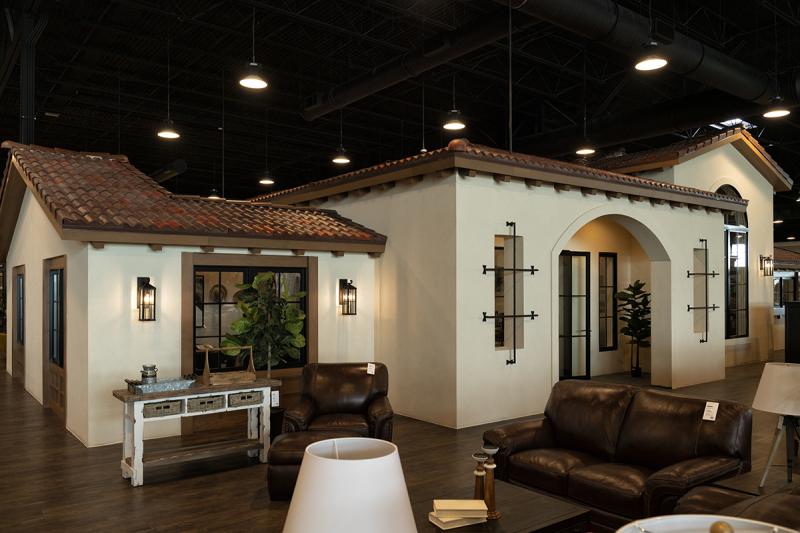 a living room filled with furniture and a table