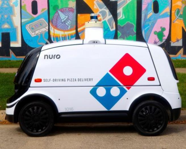 a truck is parked in front of a car