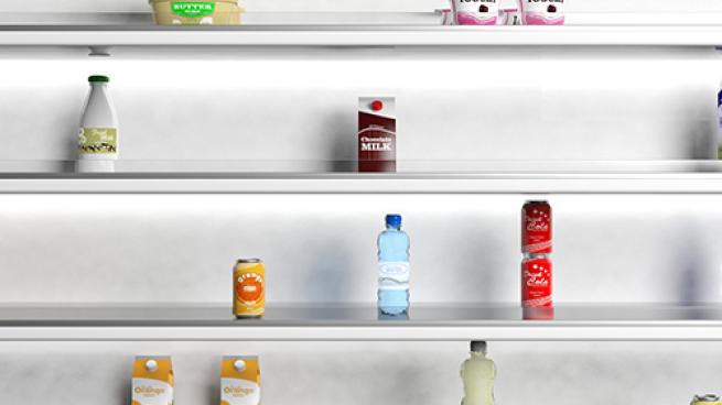 a bottle with a drink in front of a refrigerator