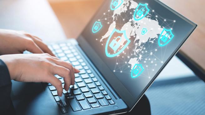 a close up of a person using a laptop computer