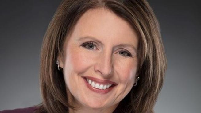 a woman smiling for the camera