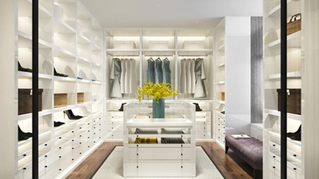 a room filled with furniture and a large window