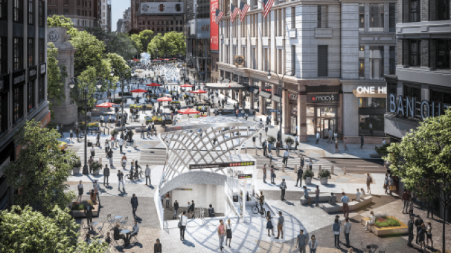 a group of people walking on a city street