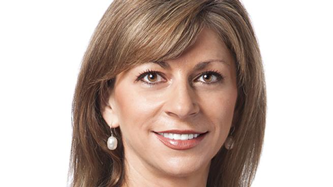 a woman smiling for the camera