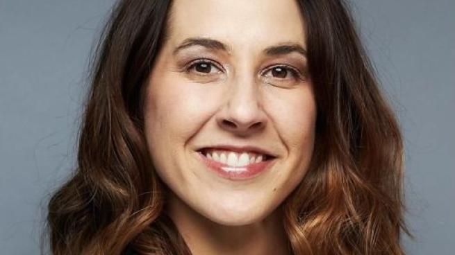 a person smiling for the camera