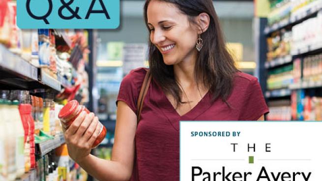 a woman standing in front of a store